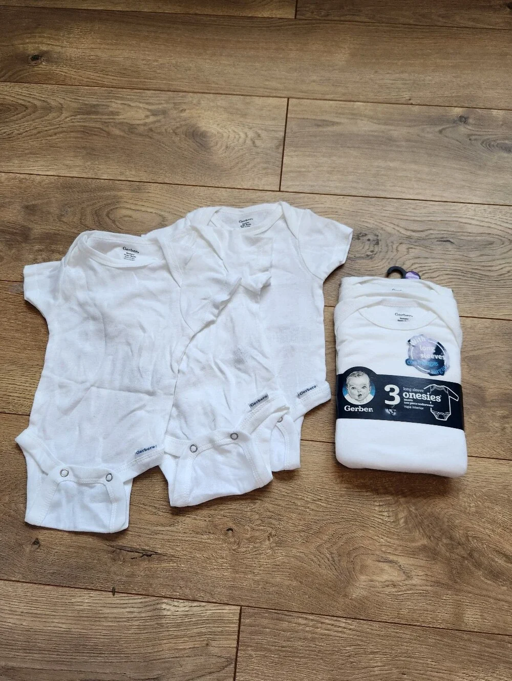 Newborn White Bodysuits